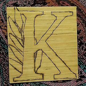 Letter "K" wood art, wood burning